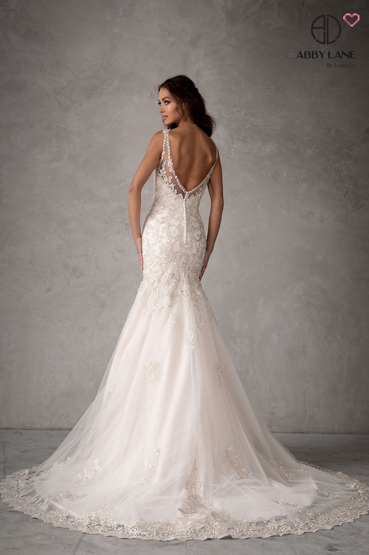 EMBROIDERED TULLE MERMAID BRIDAL GOWN WITH OPEN BACK COVERED BUTTONS AND TRAIN BY ABBY PARIS 97110